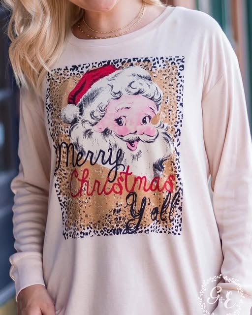 A Santa sweatshirt reading “Merry Christmas Y’all” from the boutique